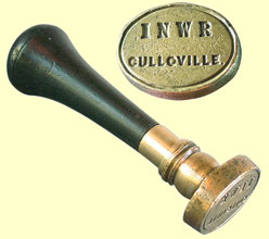 click for 13K .jpg image of INWR brass stamp