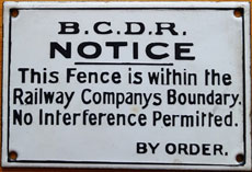 click for 15K .jpg image of BCDR enamel fence notice