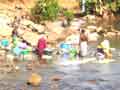 Washing in Gambia river 2